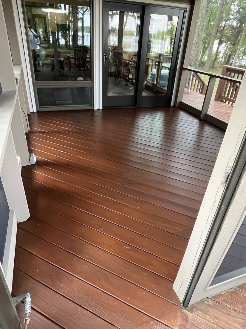 Freshly stained screened porch floor